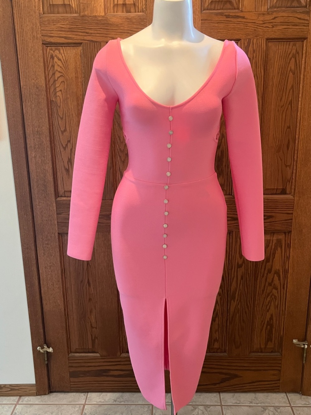 NWOT bodycon midi dress with peek-a-boos and front slit XS